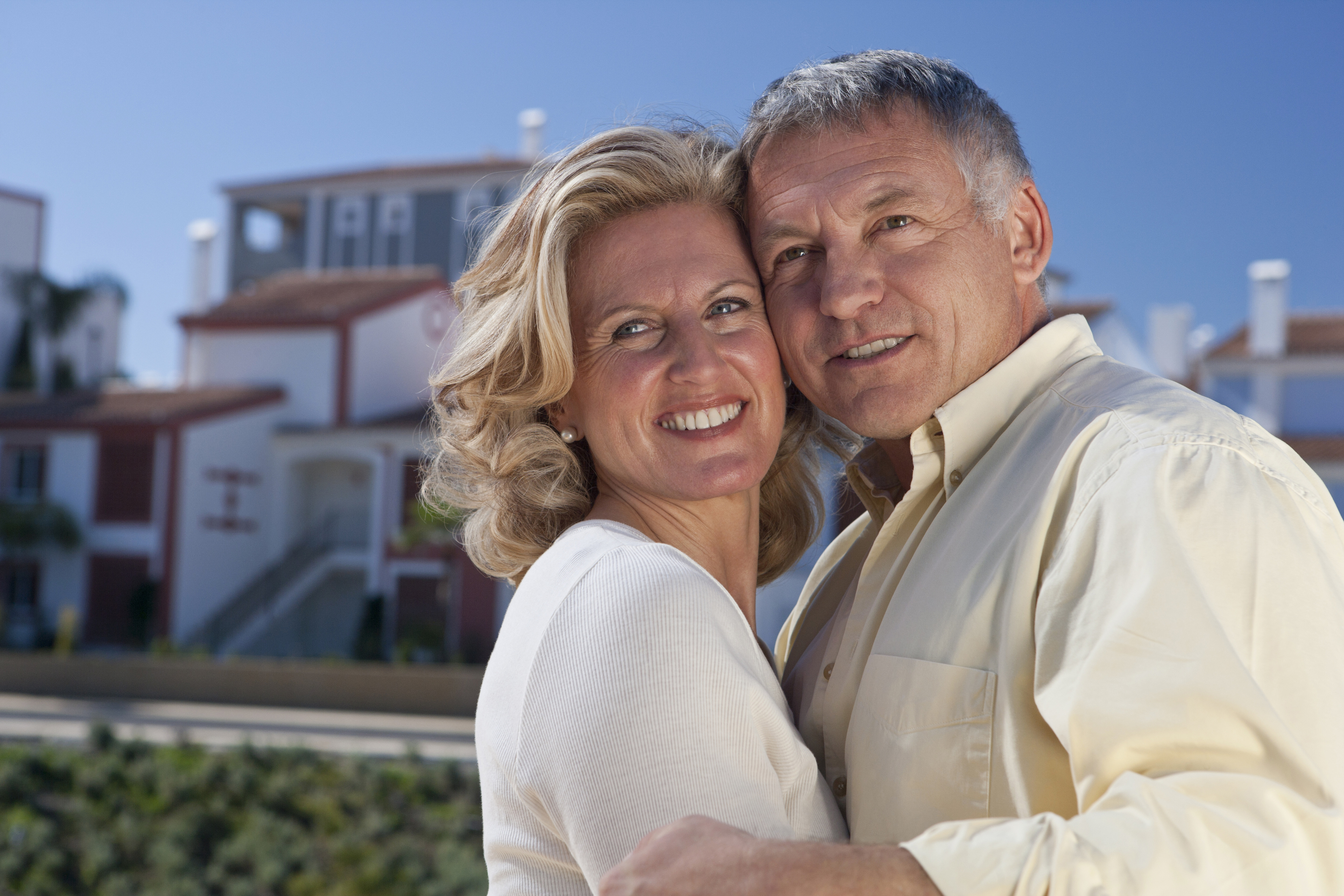 Mature couple by property development